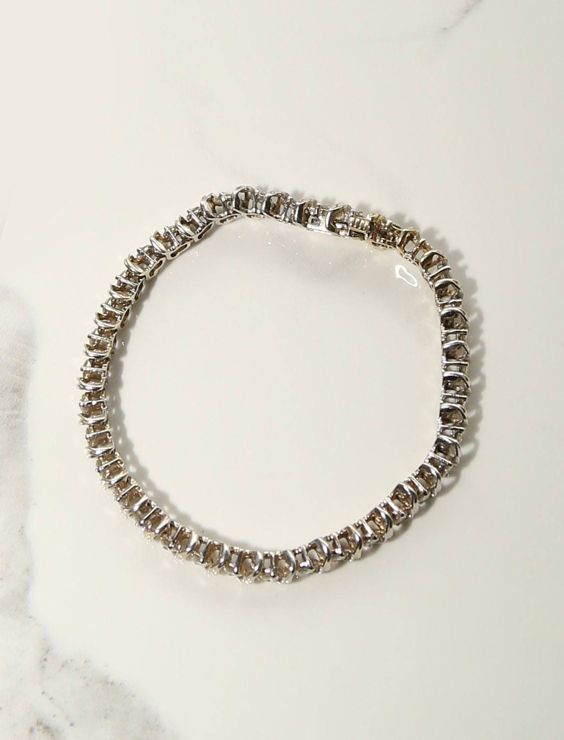 Vintage 14k gold diamond tennis bracelet