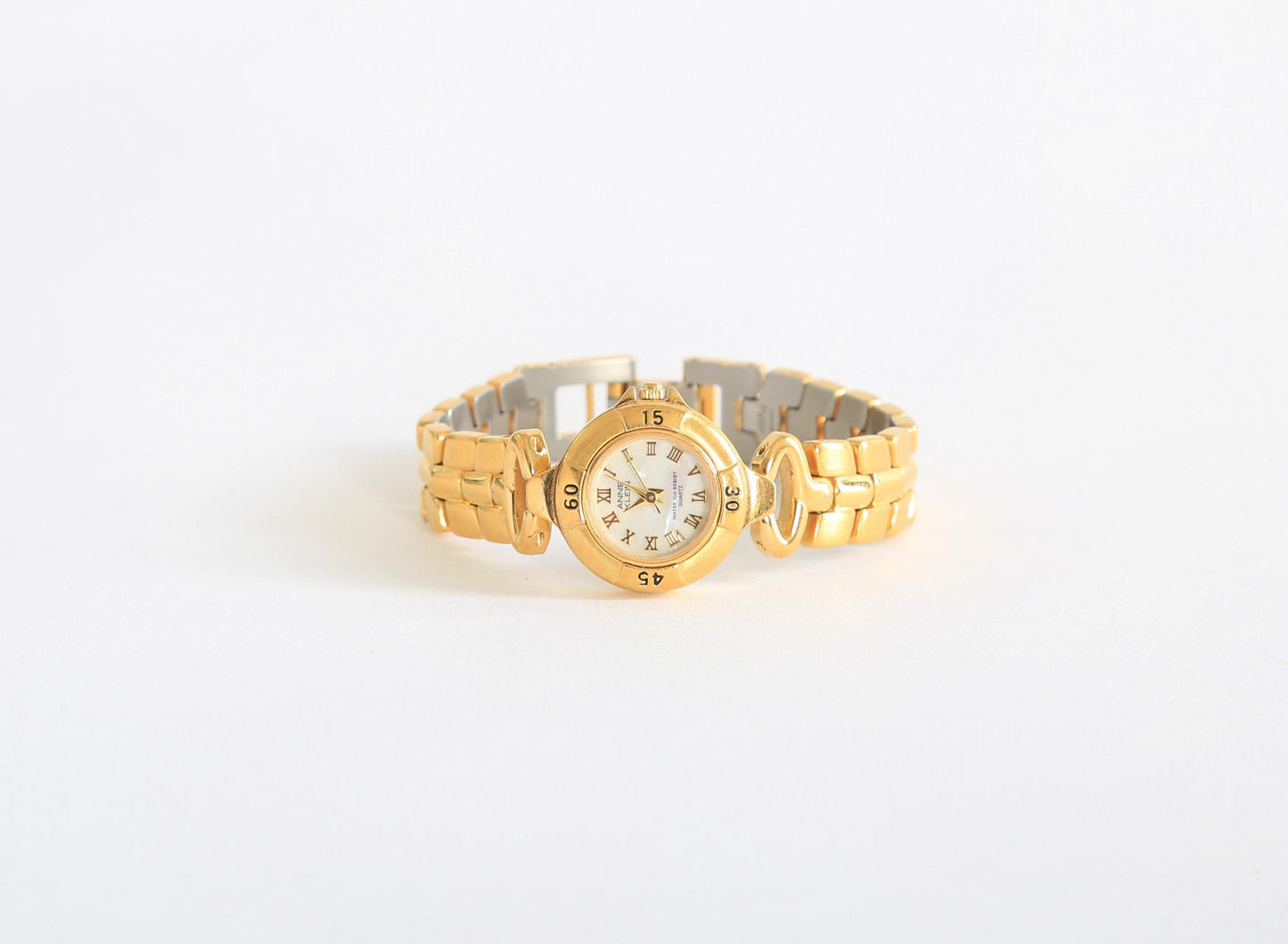 Vintage Anne Klein 753 Bezel Goldtone mother of pearl Swiss made woman's watch