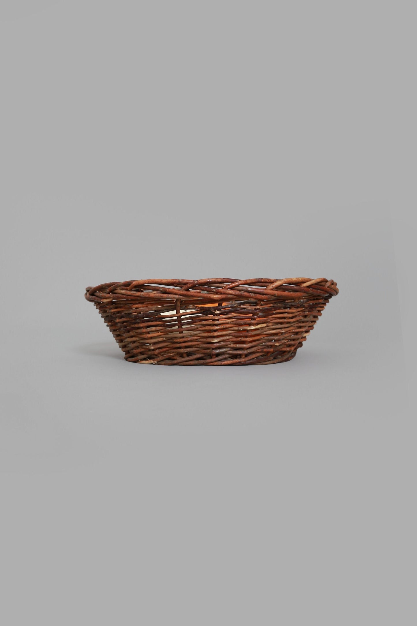 Vintage woven grape vine twig harvest basket