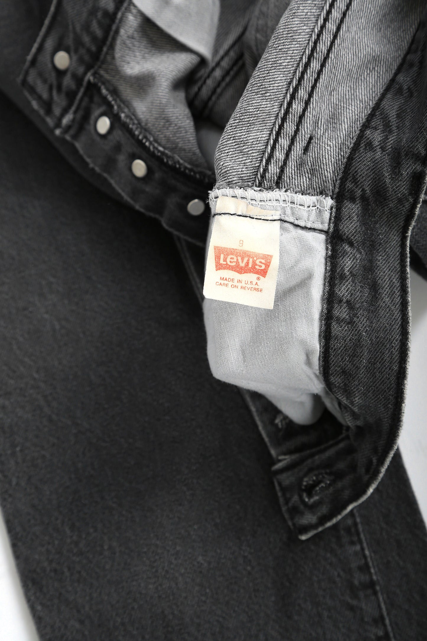 Vintage 90s 501 black Levis black button fly denim red tab straight jeans USA W27 L30