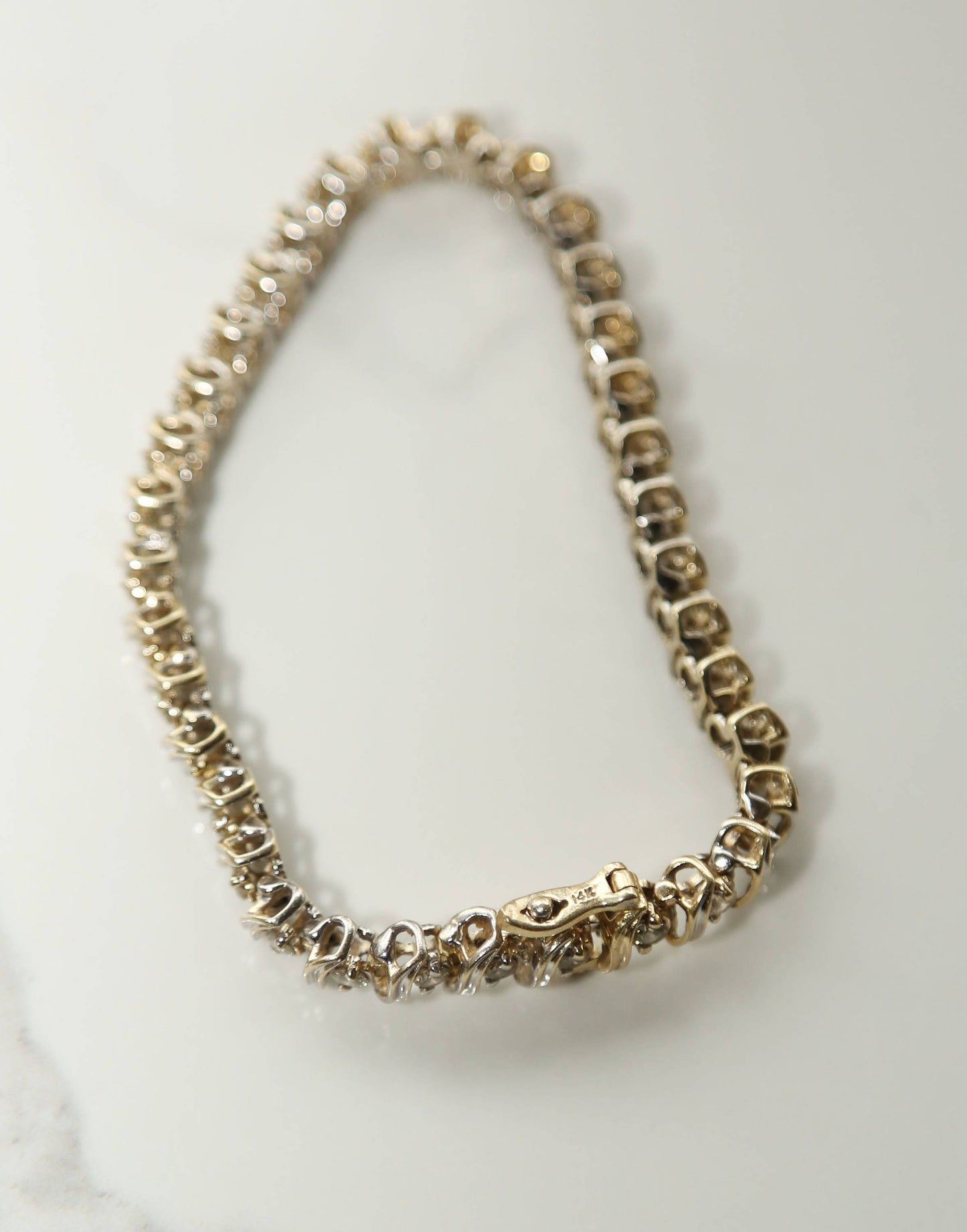 Vintage 14k gold diamond tennis bracelet