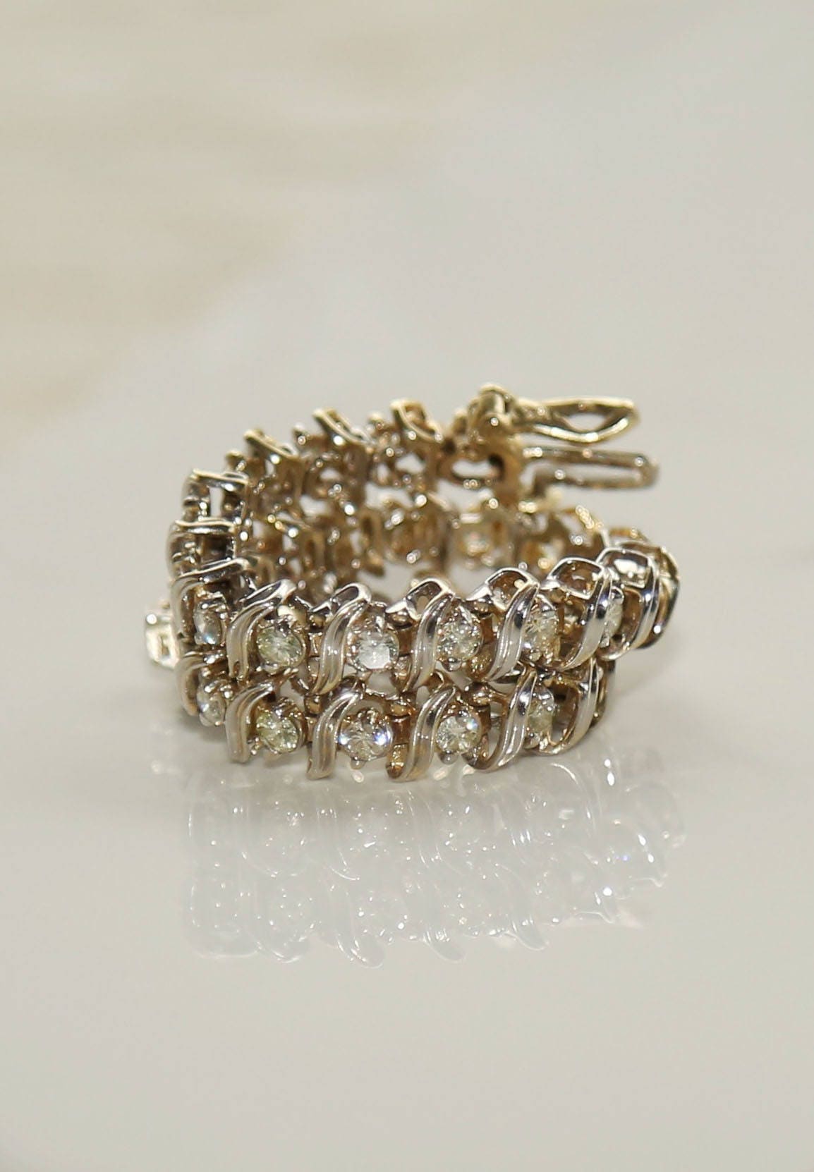 Vintage 14k gold diamond tennis bracelet