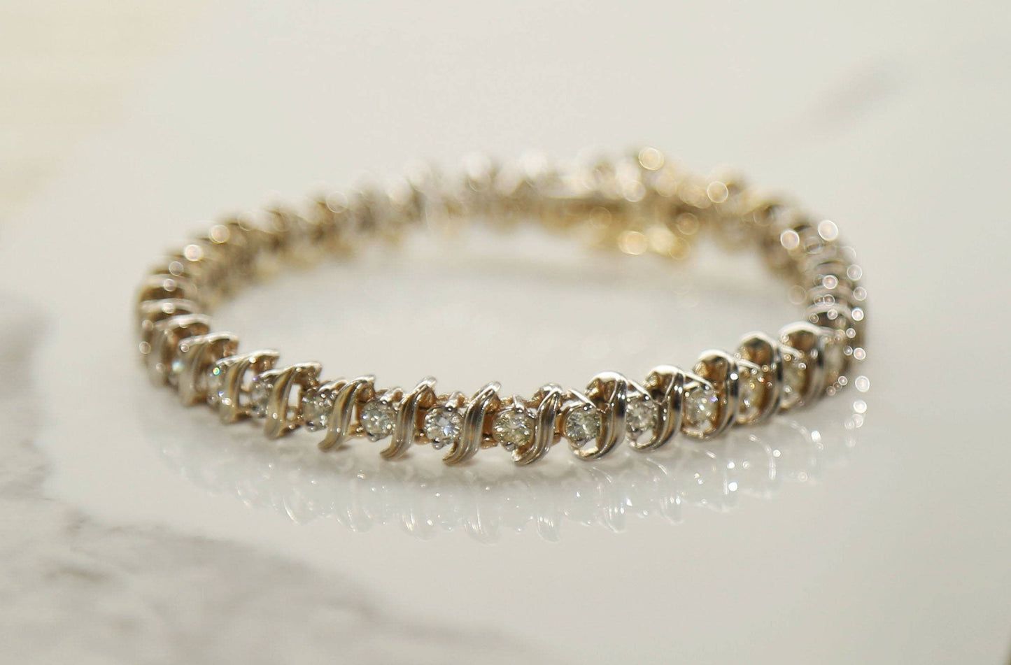 Vintage 14k gold diamond tennis bracelet
