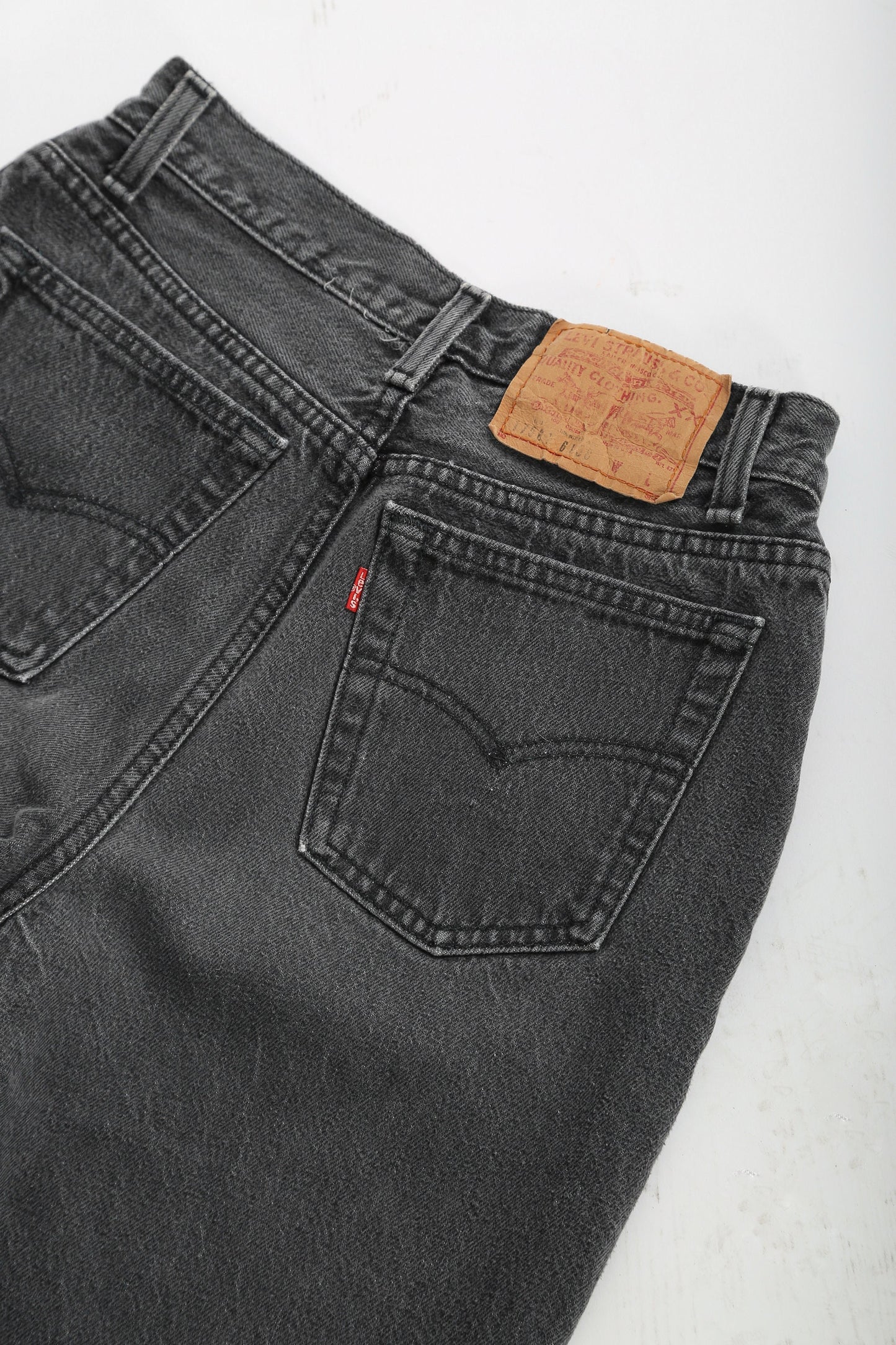 Vintage 90s 501 black Levis black button fly denim red tab straight jeans USA W27 L30