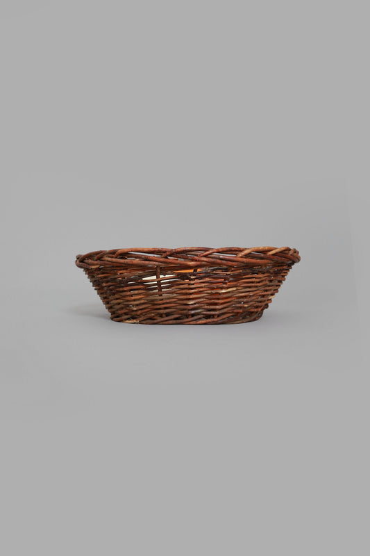 Vintage woven grape vine twig harvest basket