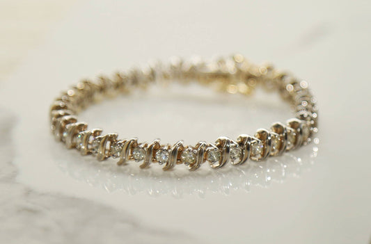Vintage 14k gold diamond tennis bracelet